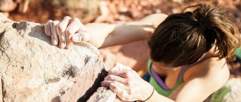 Women rock climbing