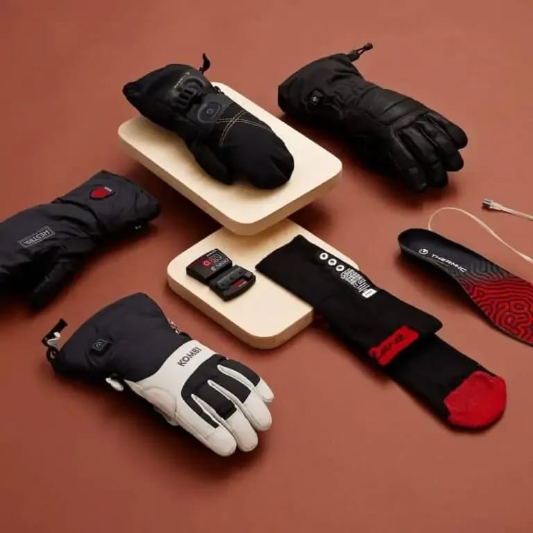 Flat lay of heated gloves and socks